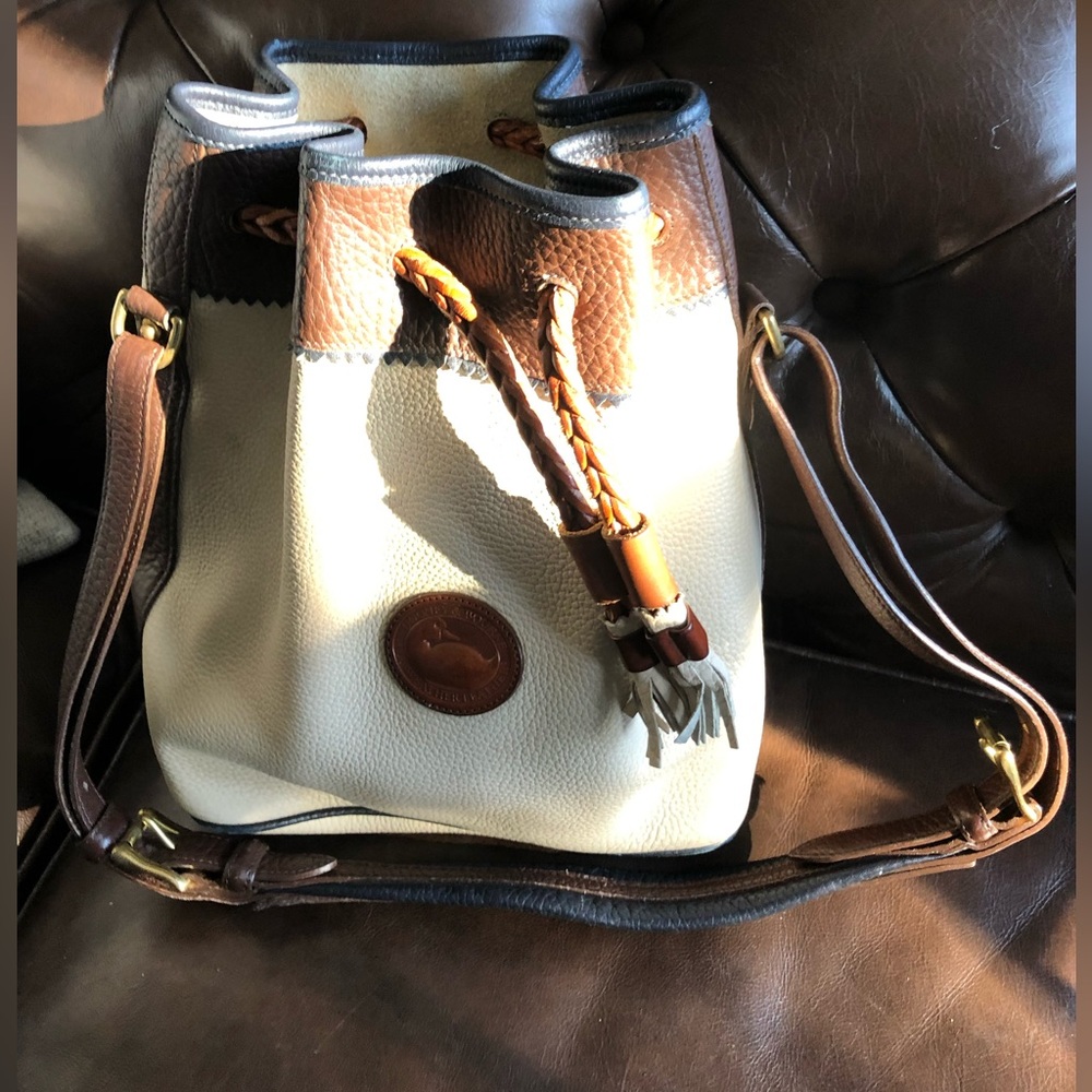 Dooney & Bourke drawstring bag w/ strap